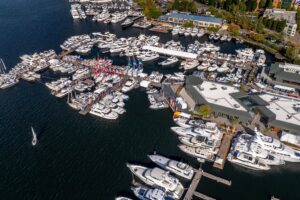 Large display of boats in the water at South Lake Union Boats Afloat Show
