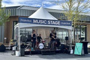 musicians perform onstage at the Boats Afloat Show